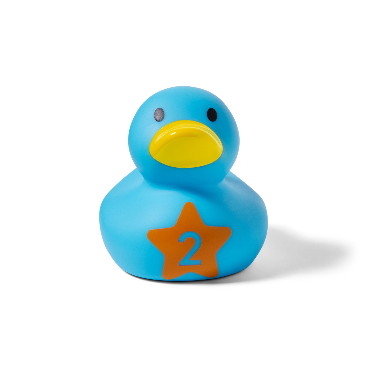The Count Quack Bath Duckies by Munchkin US UAT features a blue duck with a yellow beak, black eye, and an orange star with the number 2 on its chest, shown on a white background.