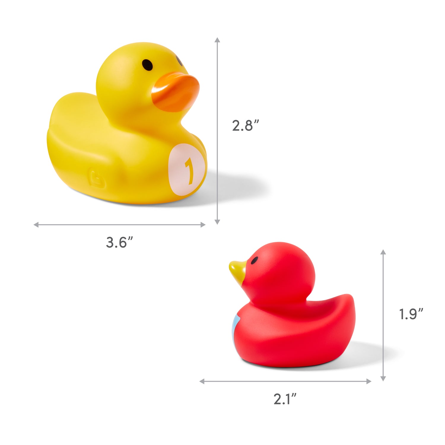 A Munchkin US UAT Count Quack Bath Duckies set features a yellow duck labeled “1” 3.6" L x 2.8" H beside a smaller red duck 2.1" L x 1.9" H, with measurement arrows indicating their sizes.
