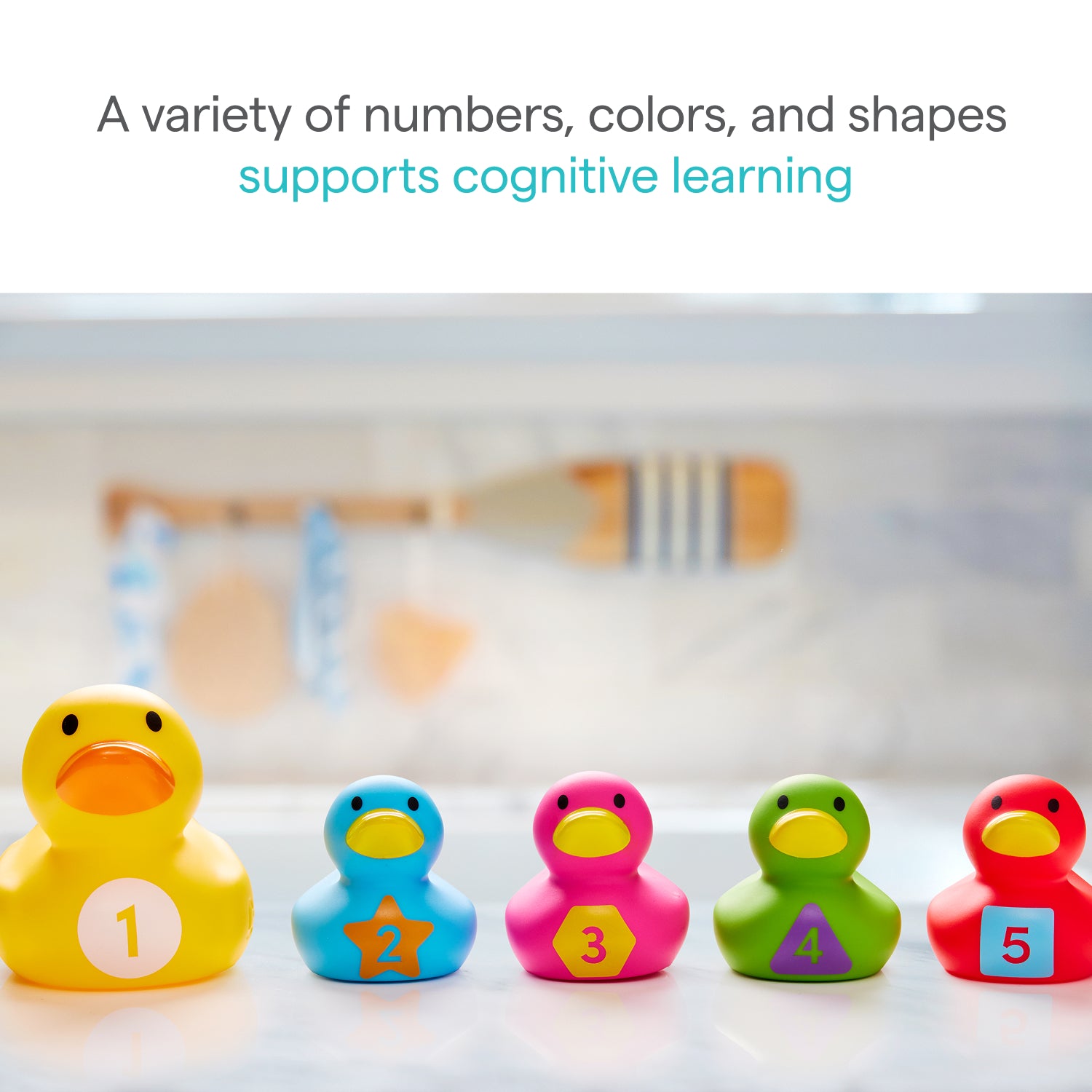 Munchkin US UAT's Count Quack Bath Duckies feature five colorful, numbered ducks in various sizes, helping children learn numbers, colors, and shapes during bath time.