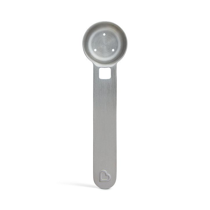 Stainless steel measuring spoon with round bowl, hanging slot and embossed heart on the handle
On white background